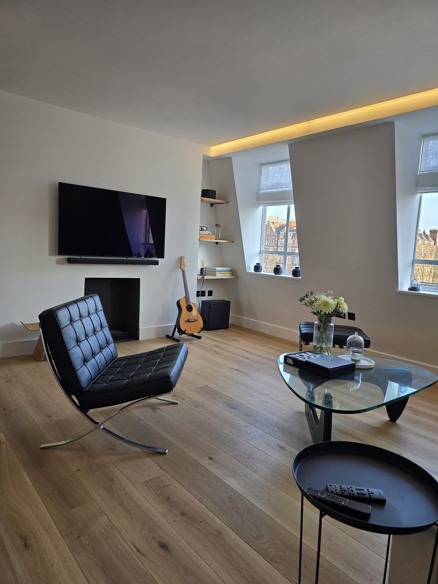 Marylebone living room after renovation, refinished with wood flooring and modern fittings
